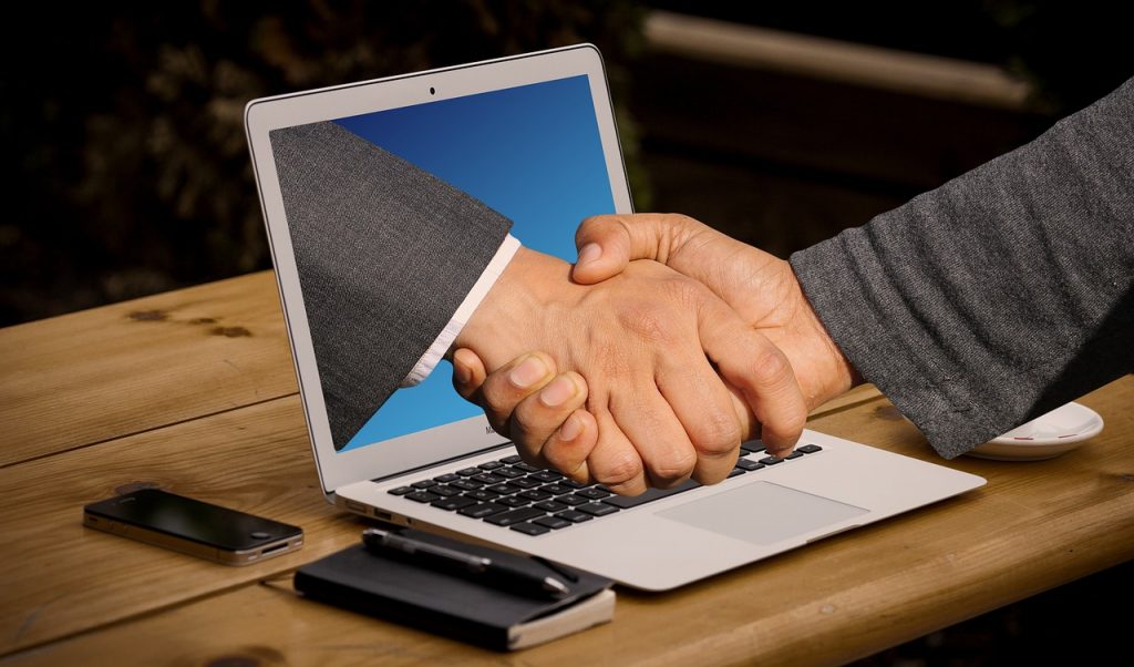 handshake, hands, laptop-3382504.jpg